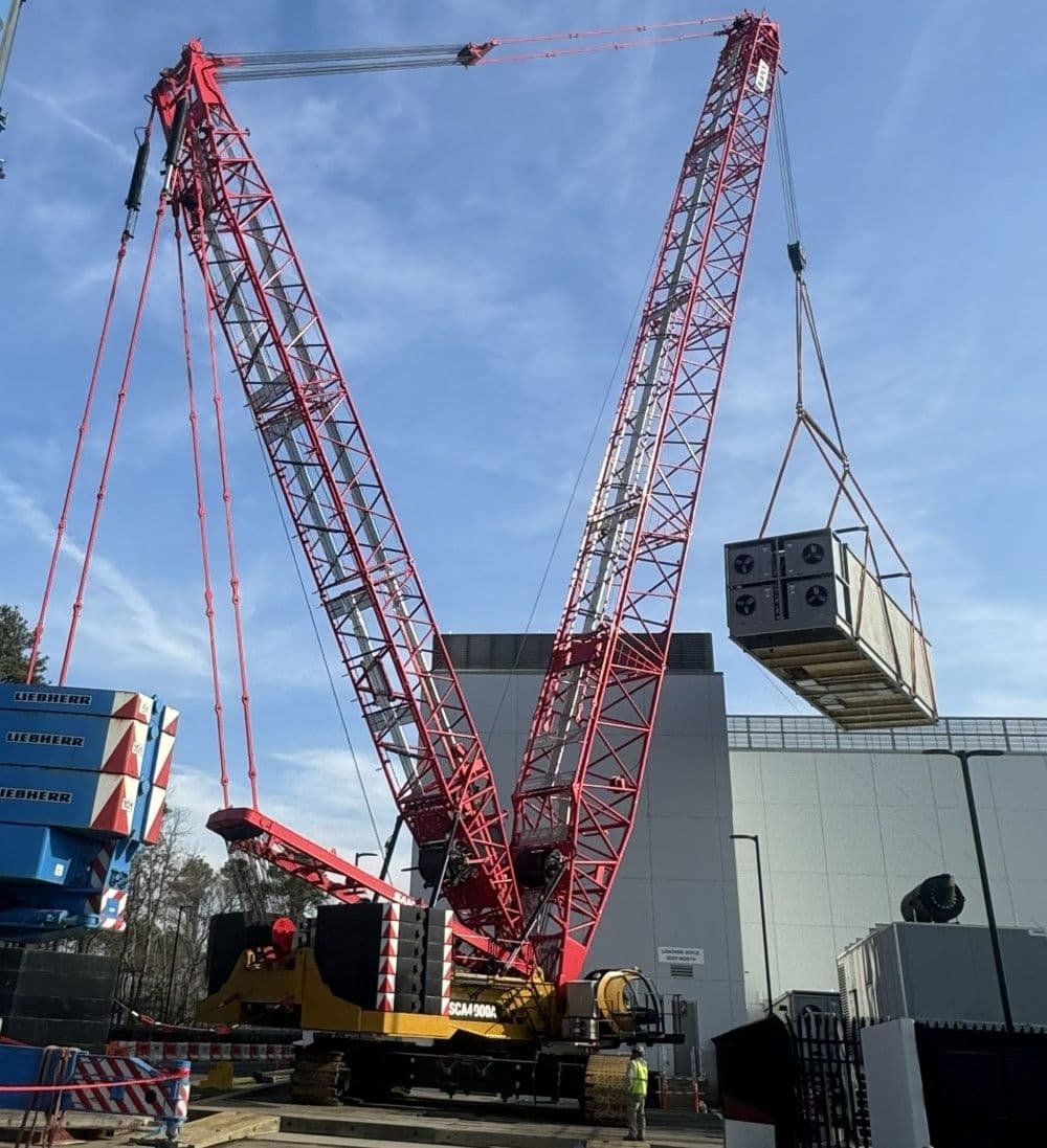 SANY crane lifting load on jobsite